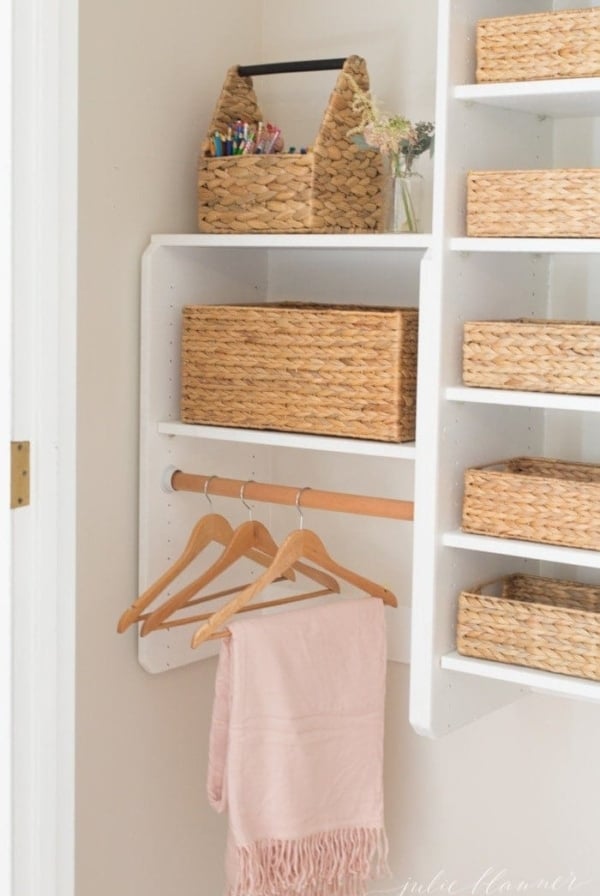 organized kids closet with hyacinth baskets
